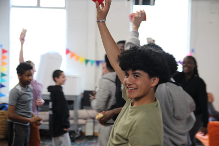 Improv Club Promotional Image, Kid smiling facing camera in Studio